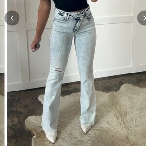 Lucy Asymmetrical Distressed Flare Jeans